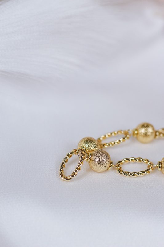 Gold Bead and Open Textured Oval Bracelet